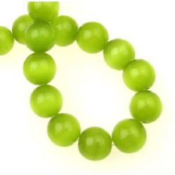 Glass beads  cat's eye ball 12 mm hole 1.5 mm green ~ 33 pieces
