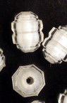 Мънисто с бяла основа цилиндър релефен 10x8 мм дупка 1 мм прозрачно -50 грама ~150 броя