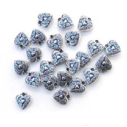 Pandantiv inimă metalică 16x15x5 mm gaură 1,5 mm argintiu -50 grame ~ 85 bucăți