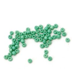 Τσέχικου τύπου γυάλινες χάντρες πάχους 2 mm ανοιχτό πράσινο -15 γραμμάρια ~ 2050 τεμάχια