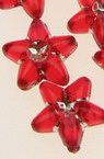 Χάντρα πλαστική  λουλούδι 10 mm διαφανές κόκκινο -50 γραμμάρια ~ 310 τεμάχια