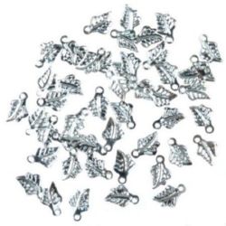 Tiny metal leaf shaped pendant 10x6x0.5 mm hole 1 mm color white - 100 pieces