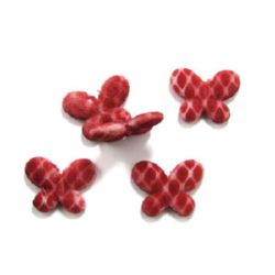 Πεταλούδα πλαστική χάντρα  30x23x5 mm τρύπα 2 mm κόκκινο με λευκό -50 γραμμάρια  ± 45 τεμάχια