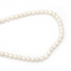 Наниз мъниста естествена перла 10~11 мм дупка 1 мм клас АА цвят крем ~39 броя