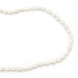 Наниз мъниста естествена перла 5~6x7~10 мм дупка 0.5 мм цвят крем ~37~45 броя