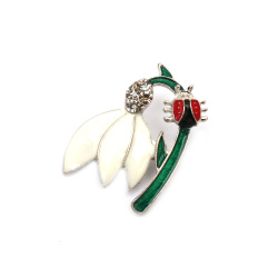 Metal brooch with crystals and paint, 40x30 mm, ladybug with a snowdrop, silver color
