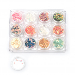 Elements for decoration in a box 30x15 mm ellipse arc -12 colors